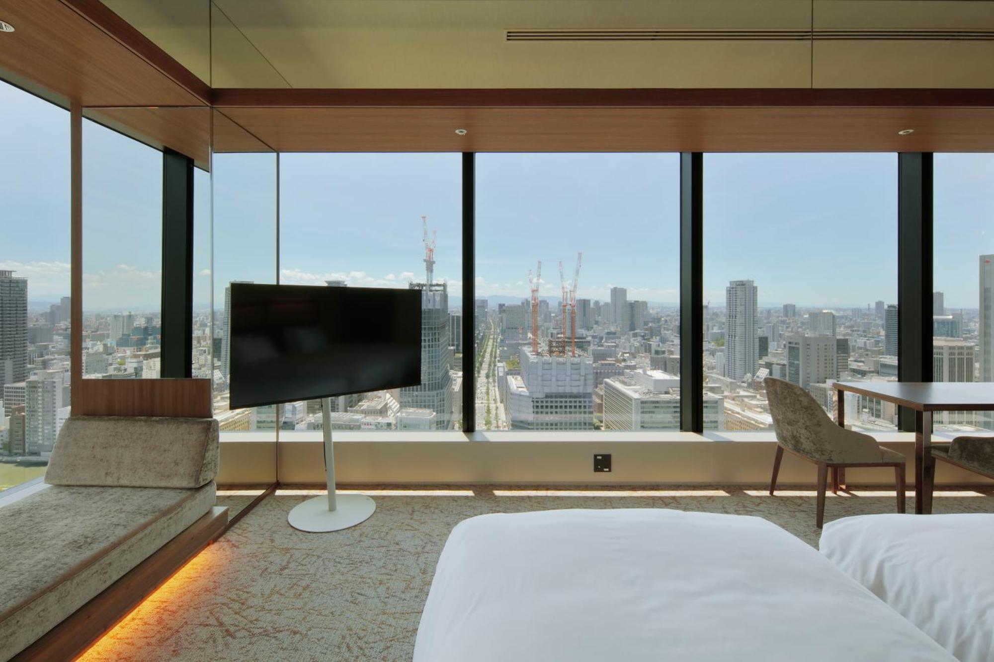 Candeo Hotels Osaka The Tower Room photo A guest room at the hotel