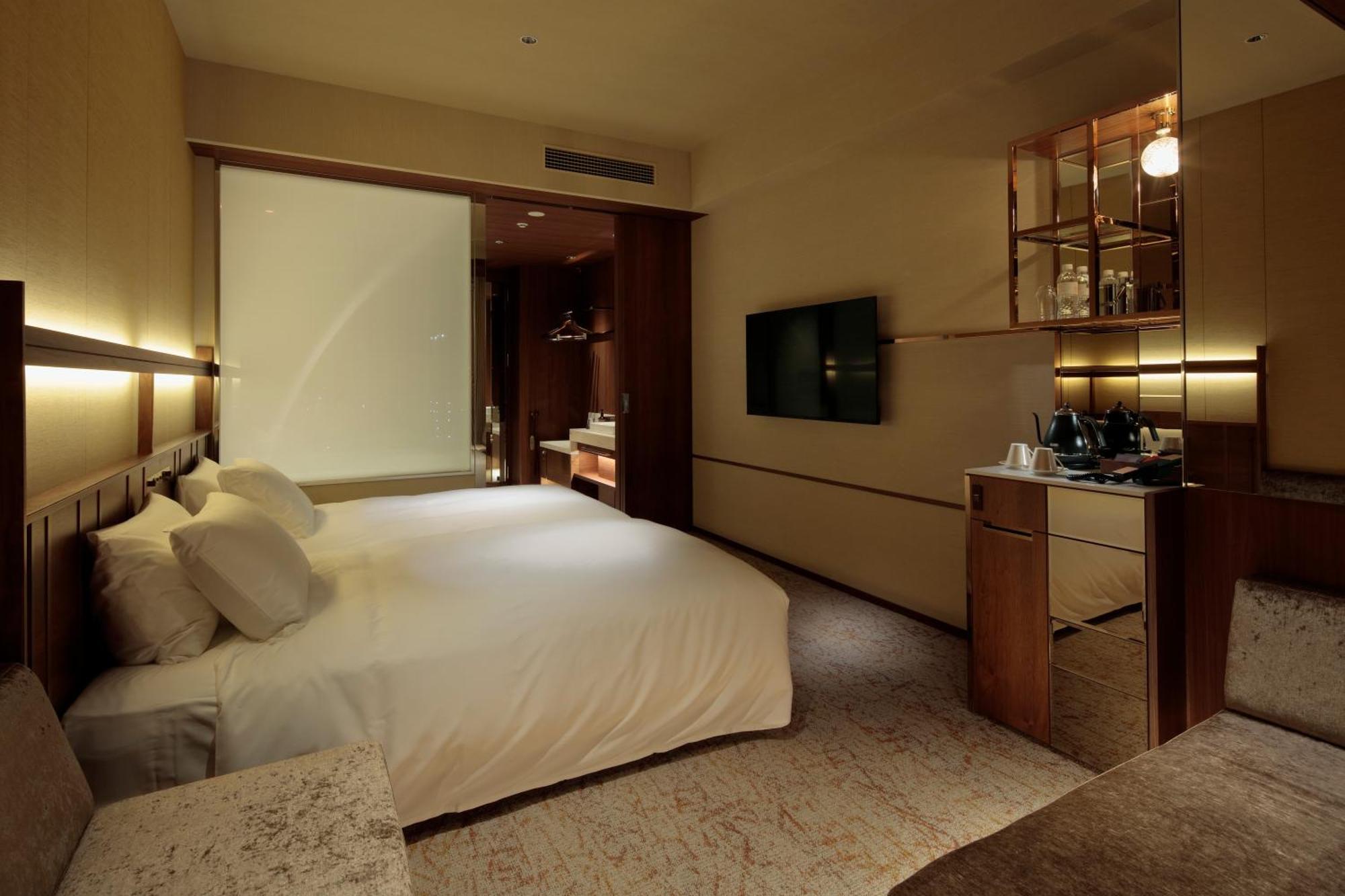 Candeo Hotels Osaka The Tower Room photo A room at the hotel